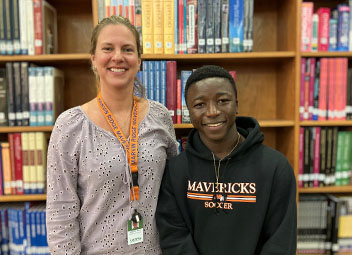  Marvin Ridge High school counselor Jeanette Beste pictured with student James Walker